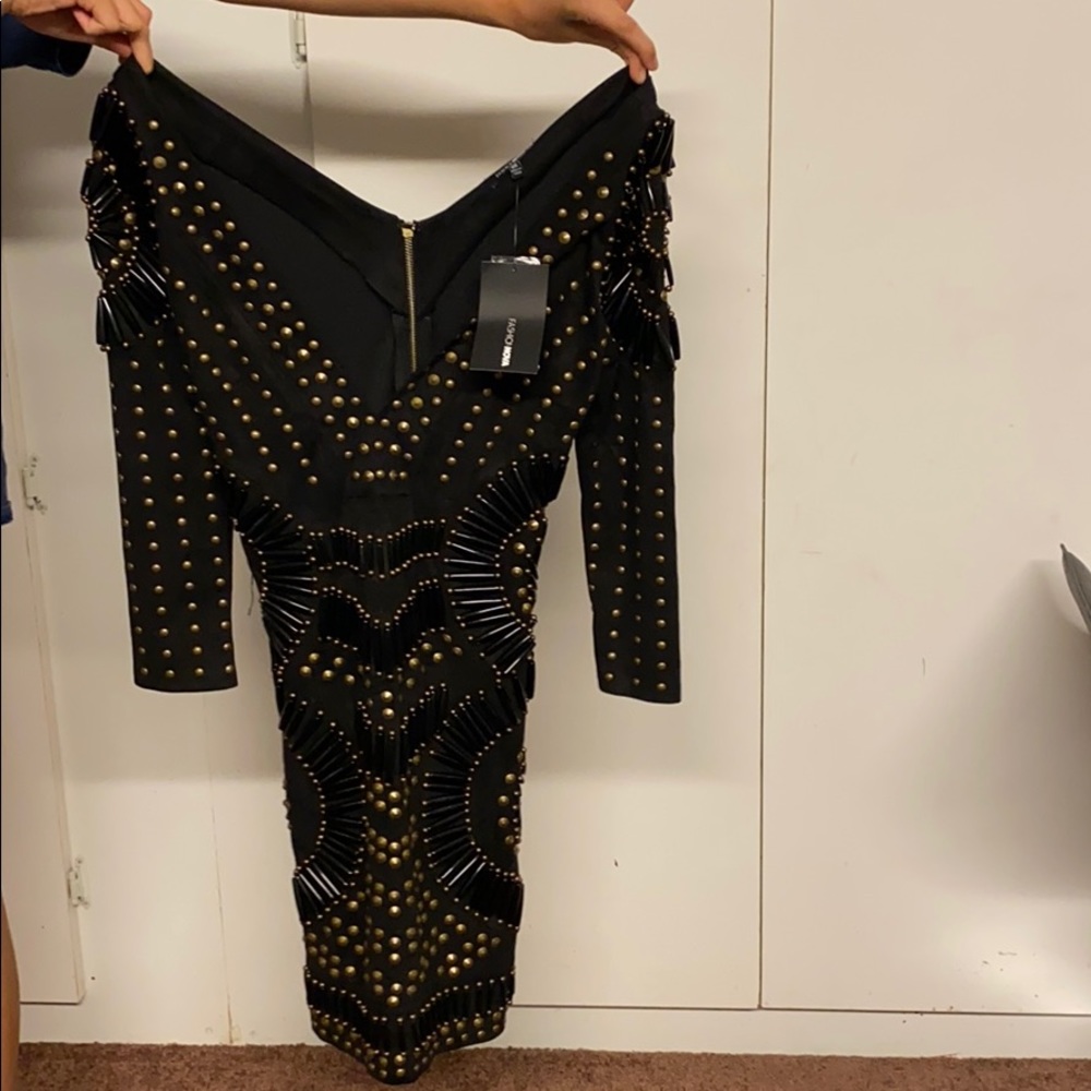 Going all out embellished suede dress